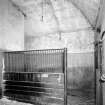Interior.
Old stable, view of 'loose boxes' from SSW.