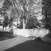 View of East garden wall with archway for roots