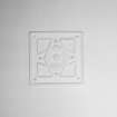 Interior. Detail of plaster panel with stylised flower