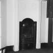 Interior. Detail of first floor bedroom fireplace