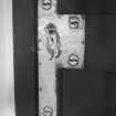 Interior. Detail of West House drawing room door handle and finger plate