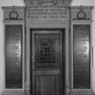 Interior. Entrance hall N wall Neo-Classical door surround  war memorial by j G Callander 1923