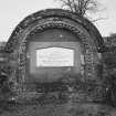View of Carthew Yorstoun arched tomb recess in burial ground, possibly part of a sedilia in reuse from Canonbie Priory.