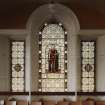 Interior.
First floor, hall, detail of NE stained glass window.