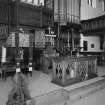 Interior. Platform area with pulpit, lecturn, communion table and organ