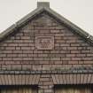 Detail of dated pediment, the plaque showing the date 1917, and the initials of the Sanquhar & Kirkconnel Coal Company.