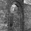 View of roundheaded doorway from NW.