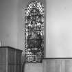 Interior.
Preaching auditorium, N wall, detail of stained glass window in memory of James Armstrong, John Carnochay, Adam Hastings and Joseph Ireland.