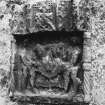 Detail of armorial panel dated 1554 on north wall