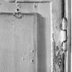Detail of hinge of door in East room (front), 2nd floor