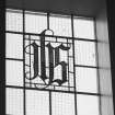 Interior. Clerestory stained glass window. (S) Detail.