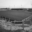 View of terracing and  South stand from West