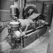 Interior detailed view of Wilson of Aberdeen oil engine, used to drive the grain dressing and conveying equipment until the conversion to mains electricity