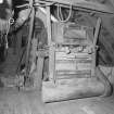 Interior detailed view (at attic level in the west end of the building) of barley dressing equipment (reciprocating sieve unit), made by A Milne & Sons of Aberdeen