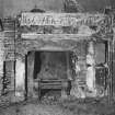 Interior.
View of remains of first-floor hall fireplace with carved lintel and frieze.
