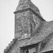 View of chimney and crowsteps on West gable of original building.