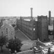 Broadford Mills: Elevated view of main part of Broadford Works (NJ90NW 125.00) from SSW, from 'Bastille' warehouse on S side of Maberley Street