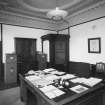 Aberdeen, Spring Garden Iron Works, interior.
General view of board room on second floor of offices, from South-East. Photograph shows 'partner's desk which is double-fronted, panneling and cornice.