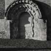 Detail of Romanesque doorway on North wall.