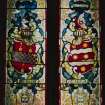 Interior, detail of heraldic stained glass in entrance door