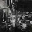Photographic copy of Interior view in Nitrocotton Department. Pulping and Finishing House showing centrifugals and Primer Presses.
