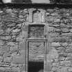 East doorway in South wall, view from outside church.