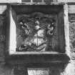 Detail of heraldic panel on E wing.