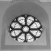 Interior.
Detail of rose window in E wall.
