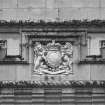 Detail of carved panel above south west entrance