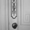 First floor, central room (South), door furniture and Greek key panelling, detail