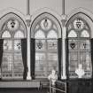 Inverness Town House, interior.  First floor: detail of stained glass window at the West end of the North wall of the main hall