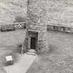 Glenfinnan Monument.  Hi-spy view of entrance to monument from West.
