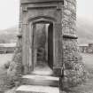 Glenfinnan Monument.  View of entrance doorway to monument from West.
