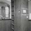 Interior. View of entrance porch showing ladder access to tower