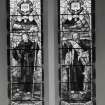 Interior. E wall detail of stained glass windows depicting Faith and Love 1923