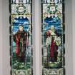 Interior. E wall detail of stained glass windows depicting Faith and Love 1923