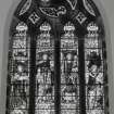 Interior. N gable detail of Andrew Carnegie Memorial stained glass window with figures of Music, Literature, Loving Kindness and Peace by Percy Bacon 1923