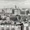 Distant view showing The Balmoral Hotel, North Bridge and the former GPO building from Salisbury Crags to South East