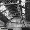 Gasworks, interior.
View of tension rod trusses over former retort house of early range.
