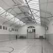 Interior. View of main gym hall from East