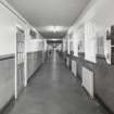 Interior. View of first floor corridor from South