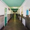 Interior. View of first floor corridor from South