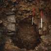 Excavation photograph : area 7, f22, stone lined pit.