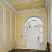 Interior. Entrance hall showing tile floor, plasterwork and fanlight