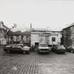 View from South South East of block containing Barley Bins and Mill Room, Old Kiln and Tailors' Hall which contained the Brewery's Sample Room, and the South end of the West wing containing the Stables