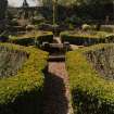Detail of 'Italian' garden showing central pond and box hedges