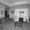 Interior.
View of first floor drawing room from E showing fireplace and ionic columned overmantle.