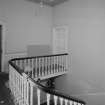 Interior.
View of staircase hall at first floor level.