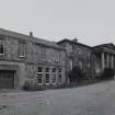 View from WSW showing original school and later buildings