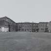 General view from N showing the rear of the original school with the former chapel to the W
